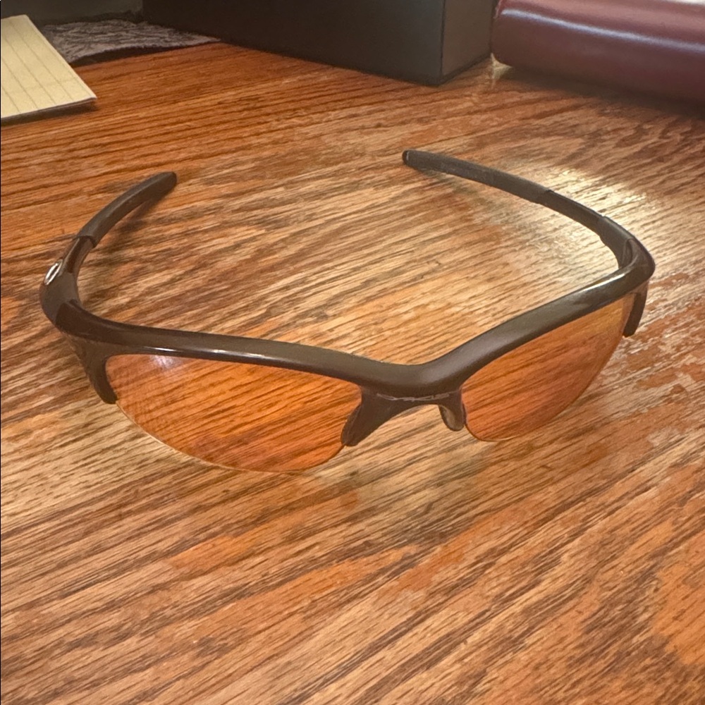 Black Oakley 1/2 Jacket Sunglasses with Orange/Brown Lenses